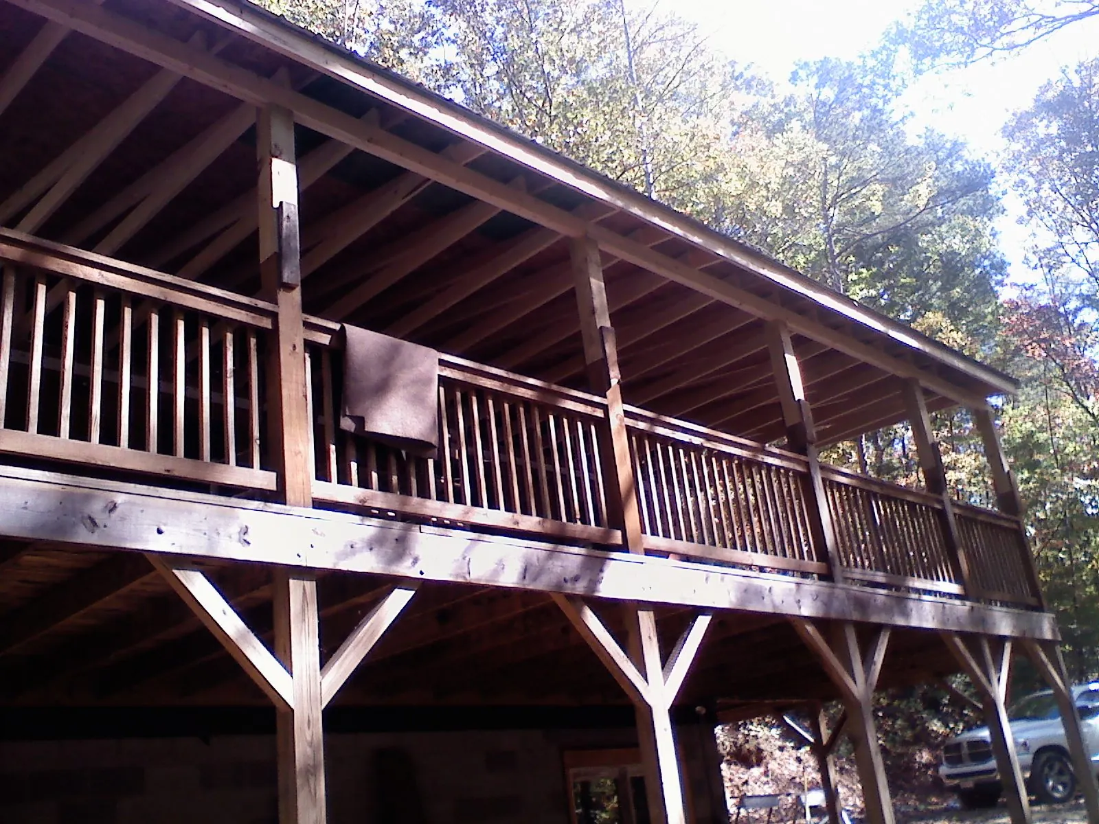 Timber framing under a new elevated porch and deck — Roof Leak Repair in Empire by Roofing Brothers